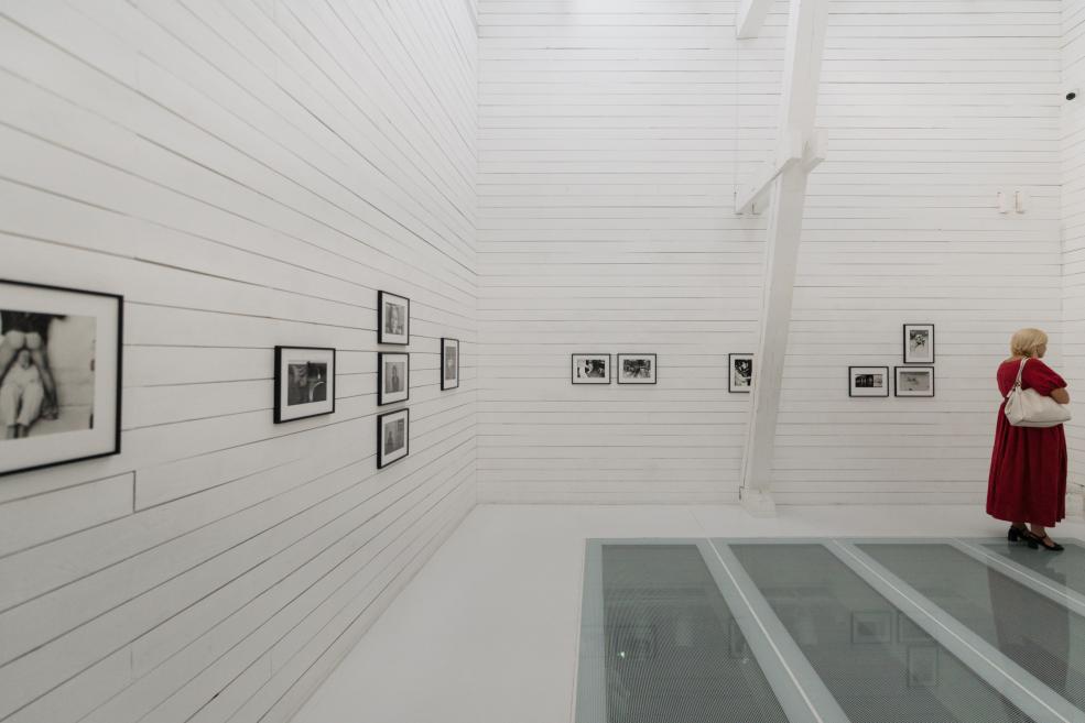 Photographs on the walls of the exhibition.